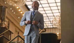 Man in a 3 piece grey suit