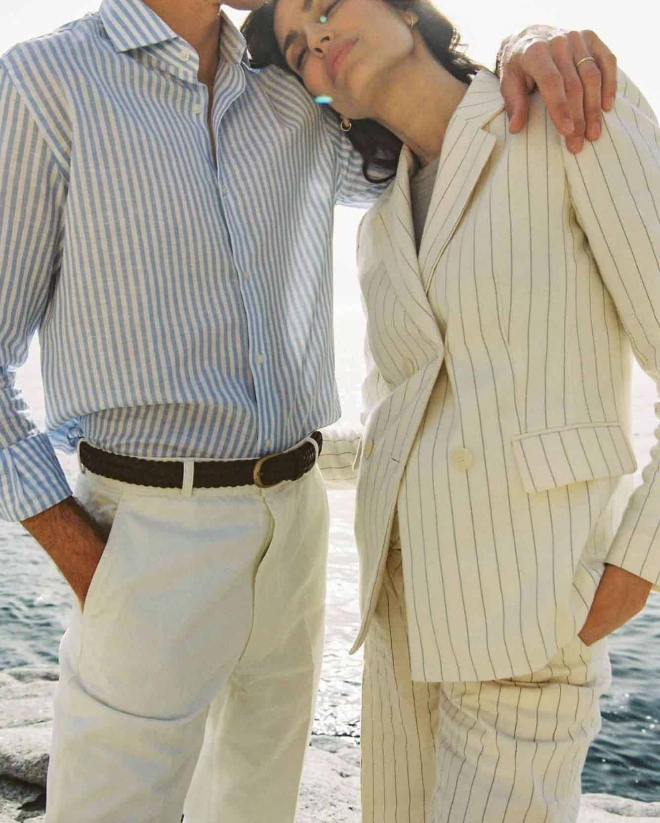 Couple by the beach hugging