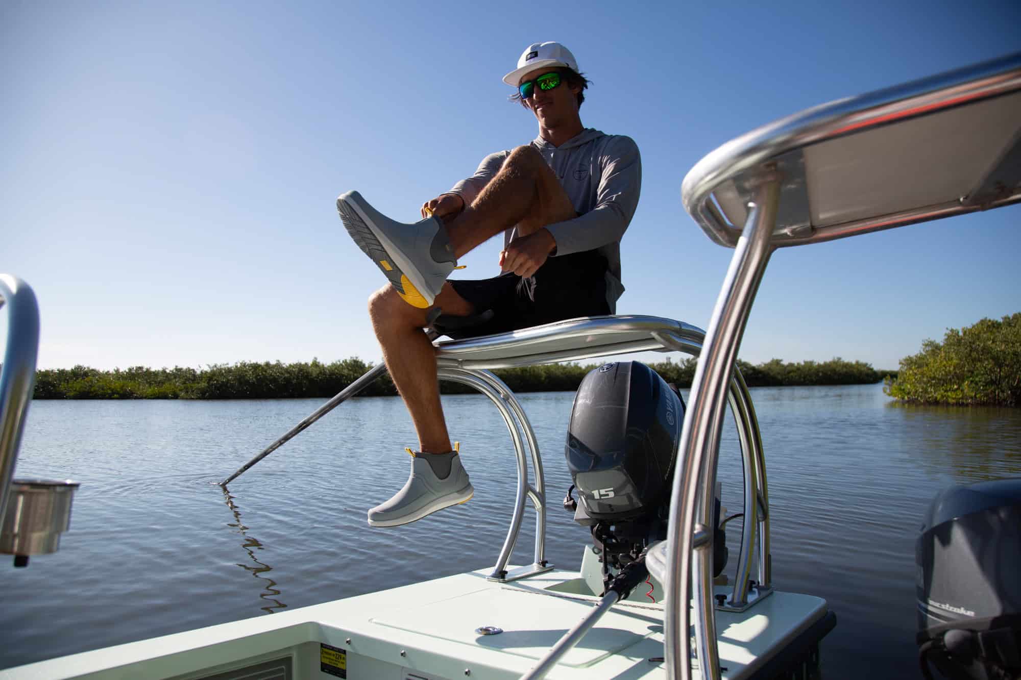 a man sitting on a boat